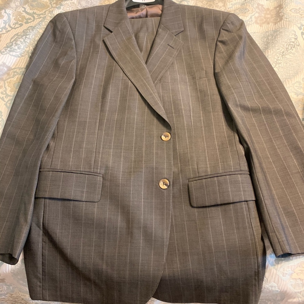 Men’s brown pin striped suit.
